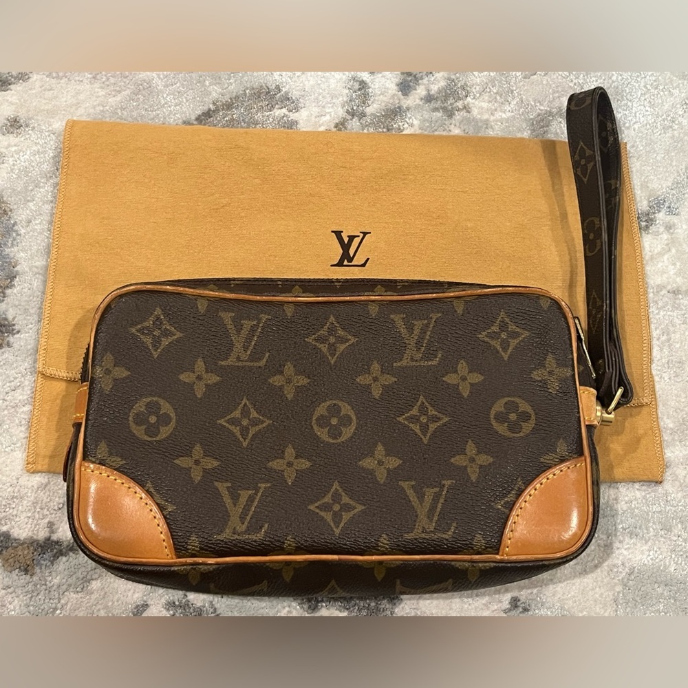 Authentic LOUIS VUITTON Marly Dragonne wristlet in Monogram PM